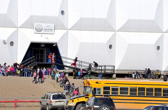 In an undated file photo, Nakasuk School students head home for the day. A report by the Auditor General of Canada, tabled Nov. 19, found an alarming number of fire safety deficiencies in Nunavut schools and daycare centres. (FILE PHOTO)