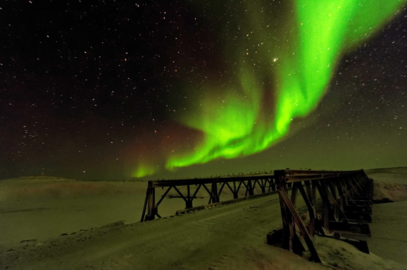 Cambridge Bay photographer Denise Lebleu snapped this shot of the northern lights billowing in the winter sky from her view of the community's bridge over Freshwater Creek Dec. 3. (PHOTO BY DENISE LEBLEU) 