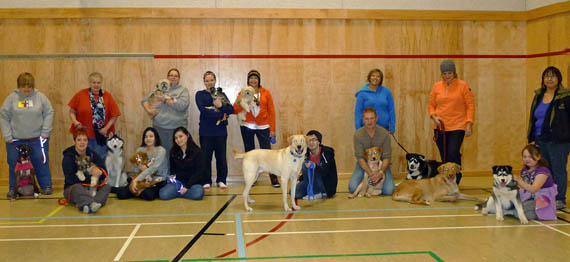 This group of dogs and their owners took part in a dog obedience class held in Cambridge Bay through the fall — a first for the community. (PHOTO COURTESY OF DENISE LEBLEU) 