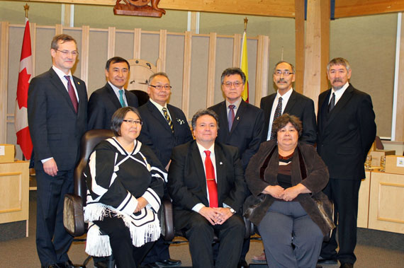 Paul Okalik (top row, second from left) poses here with the Government of Nunavut's new cabinet last November. Okalik, the new minister responsible for the Quillq Energy Corporation, had to answer questions about the government's role overseeing the power utility, after six of its board members resigned Jan. 6. (FILE PHOTO)
