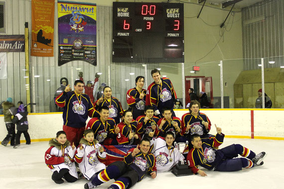 Members of Team Iqaluit pose with their gold medals March 2 after winning the 2014 Avataq Tournament in Rankin Inlet. The 13-member team went undefeated in all of their six games during the weekend tournament, eventually beating Repulse Bay 6-3 in the final. Iqaluit took a 4-1 lead in the first period, and kept Naujat back by a margin of at least two goals for the rest of the game. Iqaluit’s Sateanna Goupil netted two goals and assisted on two others, earning first star of the game honours. Repulse Bay’s Jamie Malliki earned second star for scoring twice. (PHOTO COURTESY OF NOEL KALUDJAK)