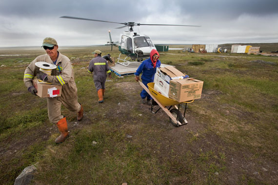 Workers haul equipment at Areva's Kiggavik project site near Baker Lake. Hundreds of kilometres south, Saskatchewan Dene say they want more input into the mining project. (FILE PHOTO) 