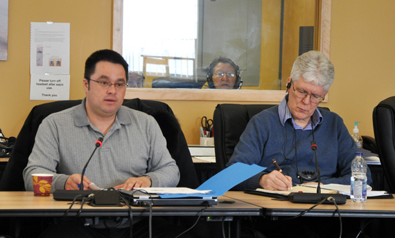 At left, George Berthe, interim president of the Kativik Municipal Housing Bureau, with the bureau's director Watson Fournier at right, speak to the Kativik Regional Government's regional council Feb. 27. (PHOTO BY SARAH ROGERS) 