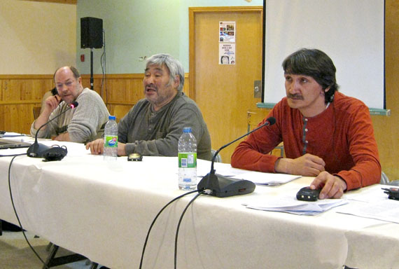 Pond Inlet mayor Charlie Inuarak, centre, chair of the 2014 Baffin Mayors’ Forum, guides proceedings on day one of the three-day series of meetings between the region’s mayors and Nunavut government officials March 4 in Iqaluit. With him are forum vice-chair Jerry Natanine, right, mayor of Clyde River, and Brian Fleming, senior administrative officer for Igloolik. The annual forum gives mayors a chance to talk directly to the territorial government’s various department representatives “in terms of what’s working in the Baffin region and what’s not working,” Fleming said. Stormy weather delayed the attendance of five of the region’s 13 mayors on the first day. (PHOTO BY PETER VARGA)