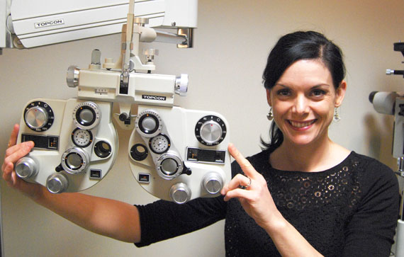 Optometrist Kathy Bourget shows off Baffin Optical's new eye exam equipment. (PHOTO COURTESY OF NUNASI) 