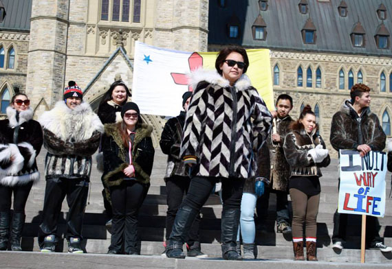 Inuit Tapiriit Kanatami teamed up with students of Ottawa-based Nunavut Sivuniksavut March 18 at a Parliament Hill demonstration to show their opposition to the European Union’s 2009 import ban on seal products as the World Trade Organization begins hearing an appeal by Canada and Norway to a WTO decision to uphold the ban. As part of the demonstration, student Shauna Angangai Seeteenak and her classmates take part in a sealskin fashion show to illustrate their support of Inuit culture and livelihoods and the sustainable use and trade of seal products. (PHOTO COURTESY OF ITK) 