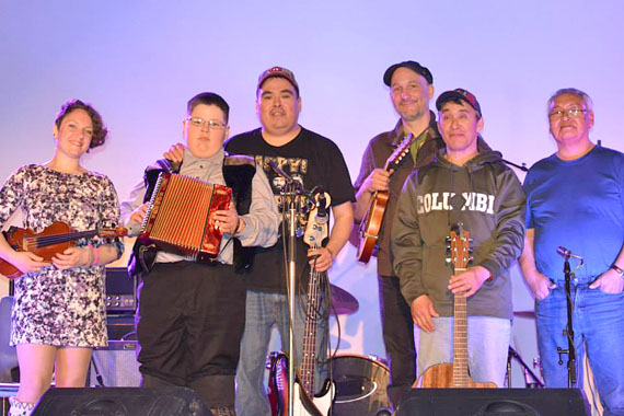 Eleven-year-old Benjamin Qaqqasiq of Iqaluit, who has been playing accordion since August 2013, rocked the stage April 19 at the Toonik Tyme closing ceremonies, when he played with with Simeonie Keenainak's band. (PHOTO COURTESY OF LINDA QAQQASIQ)