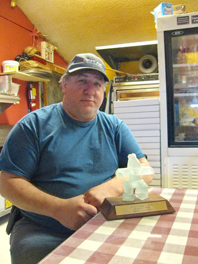 Brian Twerdin, Honorary Toonik for the 2014 Toonik Tyme festival. The Iqaluit resident earned the honour, complete with the Honorary Toonik award, pictured, for his contributions to the community. (PHOTO BY PETER VARGA)


