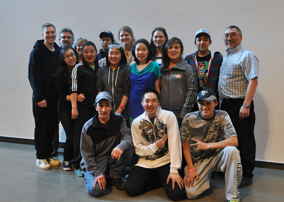 Students and teachers from Tukisiniarvik school pose with Akulivik mayor Adamie Alayco and Avataq archeologists Tommy Weetaluktuk and Pierre Desrosiers April 16 at the launch of the group’s photo exhibit in Montreal. (PHOTO BY SARAH ROGERS) 