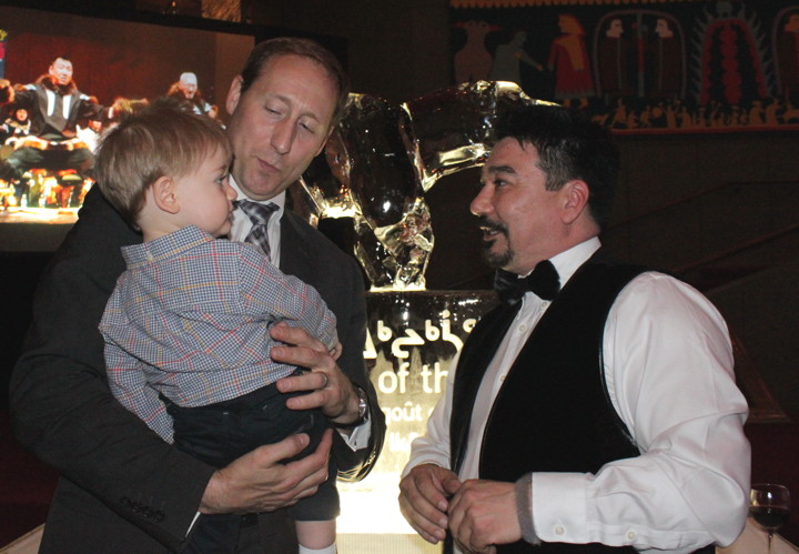 Federal Justice Minister Peter MacKay introduces his one-year-old son Kian to Terry Audla, president of Inuit Tapiriit Kanatami, at A Taste of the Arctic.