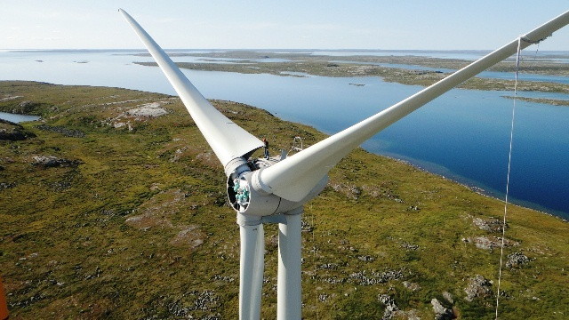 Diavik Diamond Mines’ wind turbines tower over the landscape at the Lac des Gras mine site in the Northwest Territories, to a height of 100 metres. Four of these turbines have cut back the mine’s reliance on diesel fuel by 10 per cent. (PHOTO COURTESY OF THE DIAVIK DIAMOND MINE)