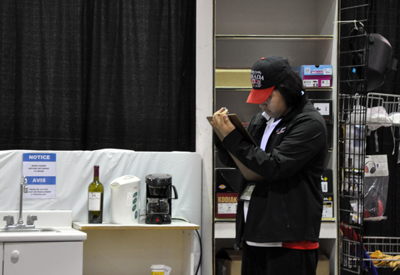 Nigel Neeveacheak from Taloyoak inspects a section of the International Centre as part of his Workplace Safety skills challenge. (PHOTO BY SARAH ROGERS) 