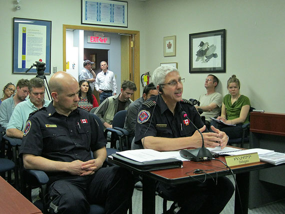 Iqaluit fire chief Luc Grandmaison at a special meeting of Iqaluit City Council Aug. 1, explaining what it will take to extinguish the city’s dump fire. The city learned that the territorial and federal governments will not give them any money to help pay for a $2.6 million plan to douse the fire. Grandmaison said the cost of putting it out is actually projected at $3.3 million, and could rise. “We’ll have to do a lot of soul-searching to look at where we can find many more dollars,” said John Hussey, chief administrative officer for the city. Council resolved to do so within a week’s time and will send the matter to its finance committee. (PHOTO BY PETER VARGA)