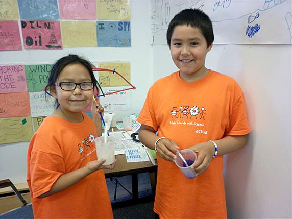 Anissa Otokiak and Cater Lear show off a project on minerals they put together as part of an ACTUA health-science camp hosted in Cambridge Bay last week. ACTUA, a registered Canadian charity, offers interactive science, engineering, technology, and mathematics  to youth aged six to 16. (PHOTO COURTESY OF NAC) 

