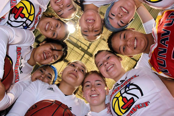 Members of Team Nunavut's girls basketball team take a moment before players hit the courts at the University of Regina July 20. That's where the team played it first game at the 2014 North American Indigenous Games, which is being hosted in Regina, Saskatchewan until July 26, gathering young indigenous athletes from across Canada and the United States. Nunavut's basketball players are off to a strong start — the girls won their first two games. (PHOTO COURTESY OF TEAM NUNAVUT) 


