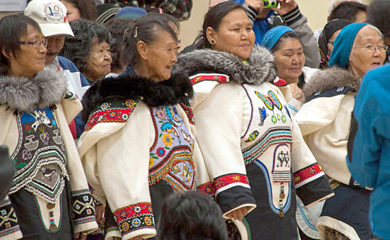 Elders from across the Eastern Arctic are gathered in Cape Dorset this week for the region's 20th annual Nunavik-Nunavut elders gathering. Here, participants take part in the opening ceremonies, held at Cape Dorset's Peter Pitseolak High School Aug. 19. The event wraps up Aug. 22. (PHOTO BY CLAUDE CONSTANTINEAU) 
