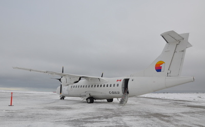A First Air ATR parked at the Whale Cove airport in 2013. (PHOTO BY SARAH ROGERS) 