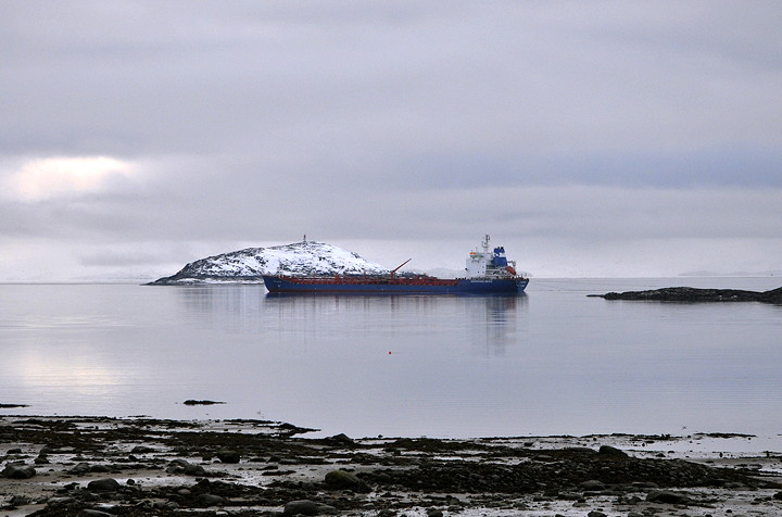 A cargo ship, belonging to the Woodward Group, sits in Frobisher Bay Nov. 4, as the open water season winds down and the sealift comes to an end. The Woodward Group owns a number of companies, including Coastal Shipping Ltd. which operates a fleet of oil tankers servicing Newfoundland and the Arctic, but also charters ships, according to their website. (PHOTO BY THOMAS ROHNER)