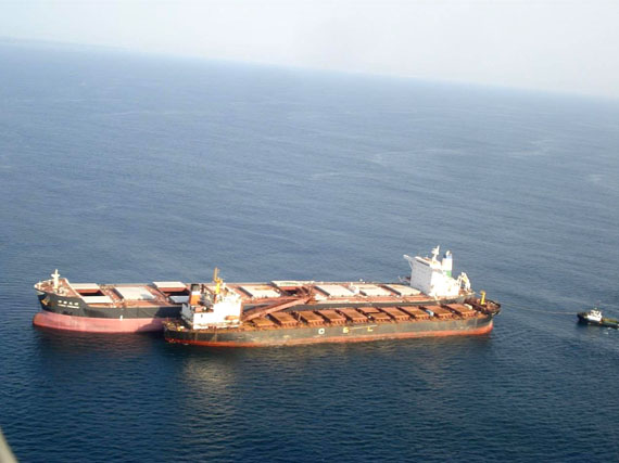 This image, from ArcelorMittal's iron ore operation in Liberia, shows how the trans-shipment of iron ore works: a smaller vessel comes alongside a larger vessel and loads or discharges iron ore into its hold. Baffinland proposes a similar system for Eclipse Sound and waters off Greenland. (BAFFINLAND IMAGE)