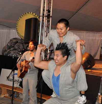 Joey Ammaq balances a fellow Artcirq performer on his shoulders during a performance at the 2011 Alianait festival in Iqaluit. Ammaq died Dec. 1. (PHOTO BY SARAH ROGERS) 