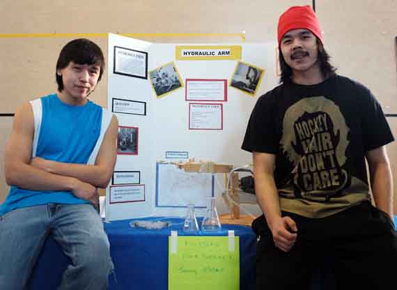 Mark Tukkiapik and Tommy Makiuk from Kuujjuaq show off the hydraulic arm they fabricated for their science fair project. (PHOTO BY JADE DUCHESNEAU-BERNIER/KSB)