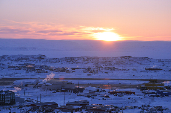The sun sets on a calm day over Iqaluit's airport Feb. 3, a day after a blizzard shut down government offices across the city Feb. 2.  Environment Canada is forecasting sunny skies and light winds in Nunavut's capital for the rest of the week. (PHOTO BY THOMAS ROHNER) 