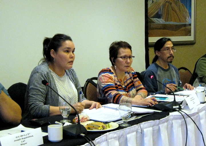 Nunavut Association of Municipalities executive director Madeleine d’Argencourt, left, and president Jeannie Ehaloak, preside over the association’s last annual general meeting in Iqaluit in November 2014. (PHOTO BY PETER VARGA)
