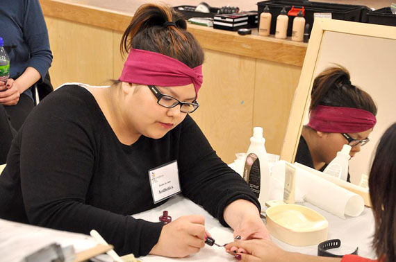 Arviat tenth grader Destiny St. John concentrates as she competes in the aesthetic competition at the territorial skills competition at Inuksuk High School in Iqaluit April 28. (PHOTO BY THOMAS ROHNER)