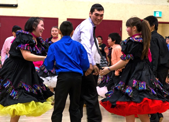 Kugluktuk square dance groups compete April 3 as part of the Kitikmeot community's Square Dance Showdown held over the long weekend. The four-day event pitted local square dance teams of all ages against dance groups from Gjoa Haven, competing for cash prizes. (PHOTO BY JESSE AJAYI) 
