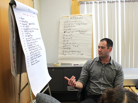 Nunavut RCMP Cst. Alex Boucher of 'V' Division's Cape Dorset detachment explains the kinds of things that can lead to trauma at a course offered this week in Iqaluit. (PHOTO BY LISA GREGOIRE)
