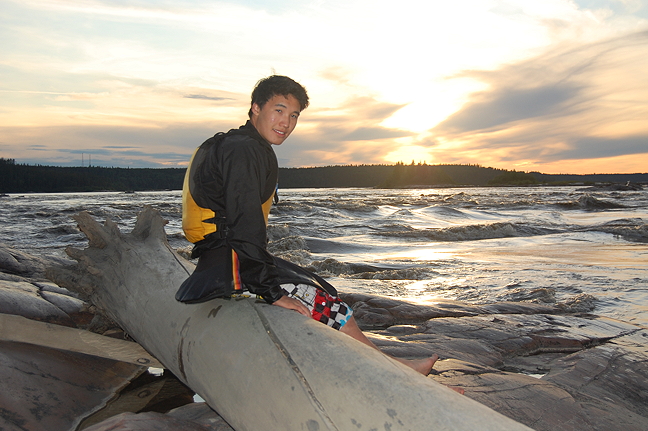 Eric Ayalik Okalitana Pelly takes a break after a day of whitewater kayaking on the Slave River 2011. (PHOTO BY RITA ANTONIAK)