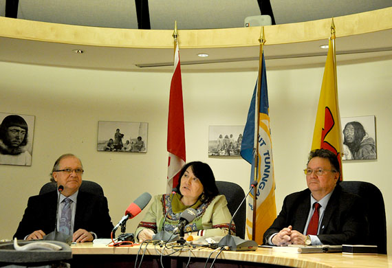 Bernard Valcourt, the minister of Aboriginal Affairs and Northern Development Canada, Cathy Towtongie, president of Nunavut Tunngavik Inc., and Peter Taptuna, premier of Nunavut, at the signing ceremony for a big out-of-court settlement agreement that resolves a lawsuit that NTI filed against Ottawa in December 2006. Ottawa will pay NTI $255.5 million in compensation. Of that, NTI will spend $175 million on training and education for Inuit. NTI will invest the remaining $80.5 million. (PHOTO BY THOMAS ROHNER)