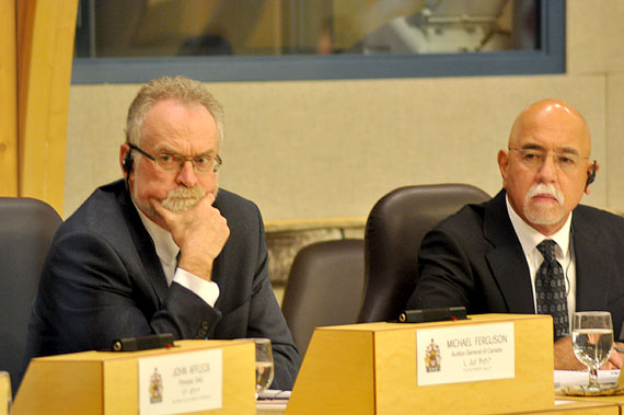 Canada's auditor general, Michael Ferguson (left), and assistant auditor general, Jerome Berthelette, listen as representatives from Nunavut's Department of Justice answer questions from MLAs May 5 at the Nunavut legislature in Iqaluit. Justice department officials and representatives from the office of the auditor general met with MLAs to discuss a report issued March 10 that slammed the Nunavut government for the poor state of the territory's jails. Read more later on Nunatsiaqonline.ca. (PHOTO BY THOMAS ROHNER) 