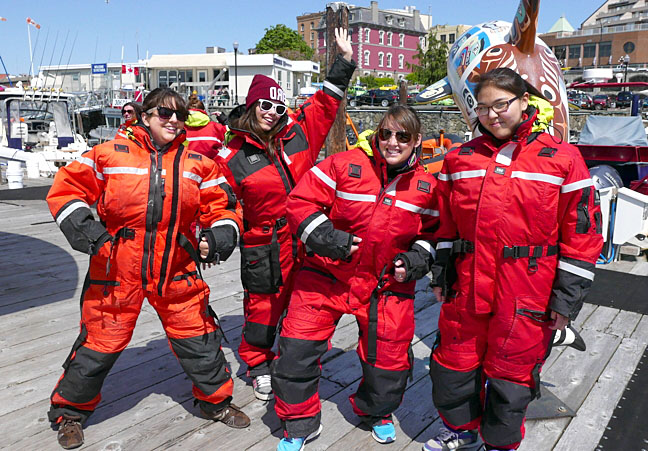 Cambridge Bay high school students Katelyn Wilson, in red tuque, and Teghan Angulalik, far right, go whale-watching in the Pacific Ocean during a recent trip to the third annual Oceans Network Canada symposium at the University of Victoria May 1 and May 2. With them are Cambridge Bay teacher Rhonda Matheson, far left, and the ONC's Natasha Ewing. ONC gathered together more than three dozen students from British Columbia, along with the two Kiilinik High School students (with financial help from the Kitikmeot Inuit Association), to promote careers in marine science and technology. ONC has a special relationship with Cambridge Bay; in 2012, the organization launched an underwater observatory just offshore of Cambridge Bay. The observatory measures such things as water temperature, sound, salinity and ice thickness and has a camera which captures action on the seabed. ONC has been partnering with Cambridge Bay residents and schools to examine the data and better understand the Arctic Ocean environment. (PHOTO COURTESY OCEANS NETWORK CANADA)