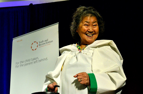 Sally Webster, formerly of Baker Lake and now an Ottawa resident, prepares to light a qulliq before the start of the Truth and Reconciliation Commission’s gathering inside the ballroom of the Delta Ottawa hotel on the morning of June 1, when she also recited a prayer in Inuktitut. The TRC will issue a summary of their final report June 2. (PHOTO BY JIM BELL)