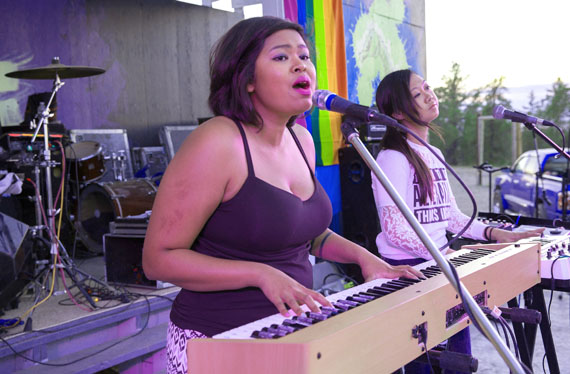 Christine Aye, left, and Gloria Guns, who make up the synth pop group Scary Bear Soundtrack, play a show in Yellowknife Aug. 9 as part of the Northwest Territories Pride festival. (PHOTO BY JAMES MACKENZIE)