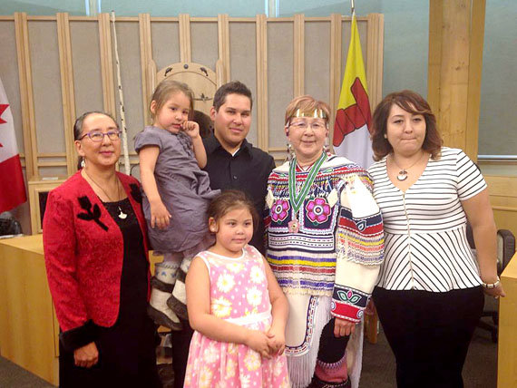 Nunavut's new commissioner, Nellie T. Kusugak, with family members at her investiture ceremony in the Nunavut legislature Sept. 18. Kusugak, who will serve a five-year term, succeeds Edna Elias of Kugluktuk, who served as commissioner from 2010 to 2015. Kusugak has already delivered one commissioner's address, or throne speech as deputy commissioner. (PHOTO COURTESY OF NANCY KARETAK-LINDELL)