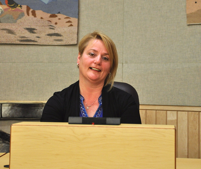 Iqaluit MLA Pat Angnakak tells fellow legislators in Iqaluit Oct. 22 that she's been both 