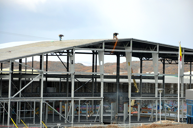 The firm constructing Iqaluit's new aquatic centre says the exterior of the building should be completed by summer 2016 with a scheduled opening of the pool still on track for 2017. (PHOTO BY THOMAS ROHNER)