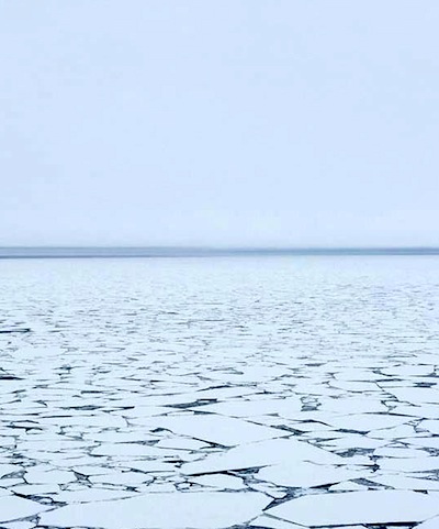 Opaque Arctic clouds over broken sea ice in May 2015 north of Svalbard, Norway. (PHOTO COURTESY OF WSU)
