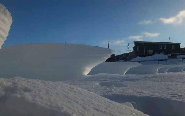 The most beautiful, natural art can come from the fiercest weather: Sanikiluaq residents were enjoying temperatures above zero on Christmas eve but then a storm blew through on Christmas Day — while many in Ontario and Quebec were experiencing a green Christmas — and dropped temperatures in that southern Hudson Bay community to -15 C within hours. These table-top snow sculptures were part of what Mother Nature left behind on Dec. 26, once the wind stopped blowing and visibility returned. (PHOTO BY SARAH MEEKO)