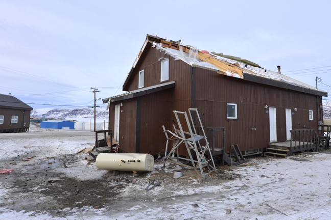 How's that for air conditioning? Part of the roof on this Pangnirtung home got sheared off through the night Jan. 12 and knocked over the fuel tank as winds gusted to more than 100 km per hour. (PHOTO BY DAVID KILABUK)