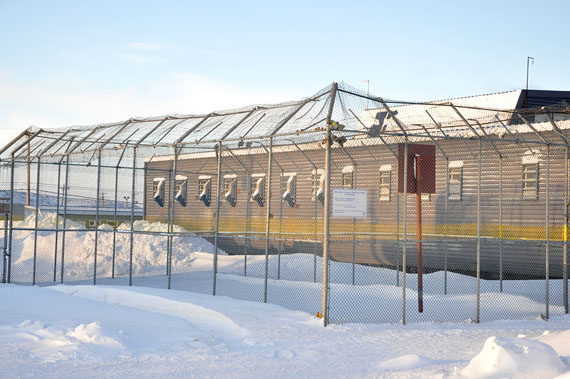 The only outdoor recreation area available to inmates at Iqaluit's Baffin Correctional Centre shows no sign of footprints Feb. 5, three days after the latest snowfall in Nunavut's capital. By Canadian and United Nations' standards, prisoners are required to have access to fresh air for a minimum of one hour per day. After one inmate at BCC told Nunatsiaq News that fresh air had been withheld for over two months, justice department officials said access to the outdoor area had been temporarily denied because of increased smuggling activity.
But that temporary measure had ended, justice officials said Jan. 13. “Regular fresh air programming occurs at all of the Department of Justice's correctional facilities,” a department official said. (PHOTO BY THOMAS ROHNER)