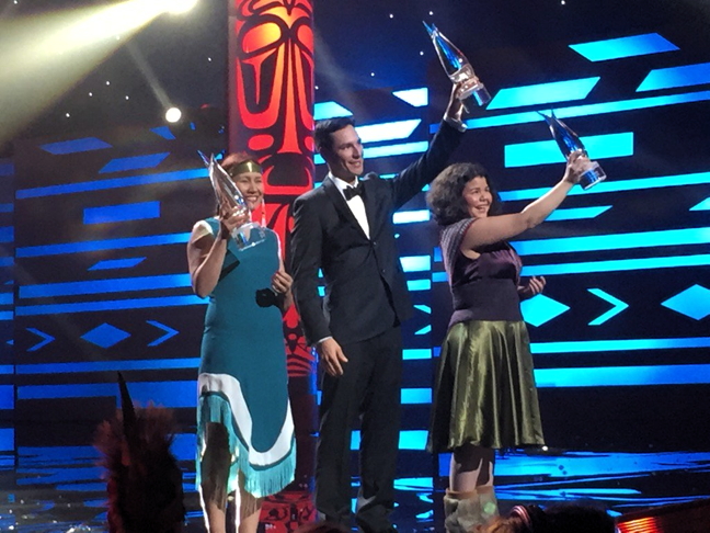 Baker Lake's Laura Arngna'naaq, left, holds up her Indspire award, handed out at a gala ceremony honouring 14 First Nations, Inuit and Metis achievers in Vancouver Feb. 12. The Indspire Awards have been celebrating the significant contributions of Aboriginal people in Canada for 23 years. In honouring high achievers and recognizing role models, organizers hope to promote self-esteem and pride within Canada's Indigenous community. Arngna'naaq, singled out in the youth category, recently completed the University of Toronto's Master of Management and Professional Accounting program and is now one of only a handful of Inuit chartered accountants in the country. (INDSPIRE TWITTER PHOTO)