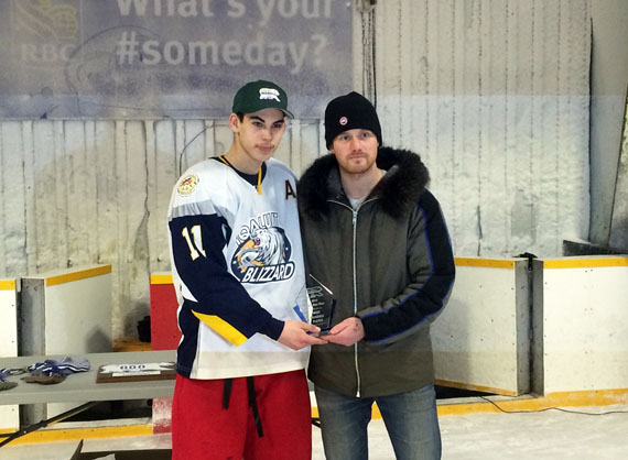 The Iqaluit Blizzards' assistant captain Maxwell Shoo, left, picks up the Most Valuable Player award following the 2016 Polar Bear Plate hockey tournament, which wrapped up in Rankin Inlet Feb. 7. The Iqaluit Blizzards were the tournament champions, winning the Feb. 7 final over Coral Harbour. Nunavut's hockey tournament season continues: the top players from this Kivalliq tournament will play the Baffin-based Challenge Cup tournament Feb. 26 to Feb. 28. (PHOTO BY NOEL KALUDJAK)