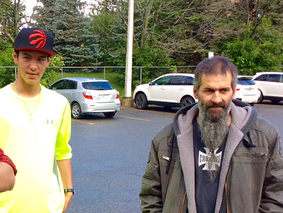 Camille Lavallée, a 14-year-old player on Team Nunavut's bantam hockey team, with his late father, Claude Lavallée. (PHOTO COURTESY OF CAMILLE LAVALLEE)
