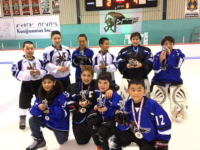 Kuujjuaq’s Best: Kuujjuaq’s Peewees and Atoms played in the first annual Winter Classic Tournament in Kuujjuaq Feb. 26 to 28. Outstanding achievement awards were handed out in both divisions to the tournament's best players. Front row, from left, Best Sportsmanship: Benjamin Gosselin (Peewee), Tournament MVPs:  Sandy Tooma (Peewee) and Andrew Gordon (Atoms), Best Sportsmanship: Anthony Adams (Atoms). Back row, from left, Best Defense: Matthew Berthe (Atoms) and Bridget Kleist (Peewee), Best Forward: Ahoyak Koneak (Peewee) and Isaiah Nuktie (Atoms), Best Goalie: Etua Watt (Peewee) and Jeremy Tasse (Atoms). (PHOTO COURTESY OF J. MATCHETT)