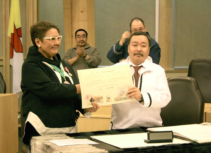 Pauloosie Keyootak, seen here Feb. 24 taking his oath of office as the new MLA for Uqqummiut, has been reported overdue after departing Iqaluit March 22 by snowmobile for Pangnirtung, along with two companions. The group did not arrive when expected March 24. On March 27, sources informed Nunatsiaq News that two searchers from Iqaluit have headed out along the Pangnirtung trail and that the search and rescue group in Pangnirtung is preparing to take part. A spokesperson for Nunavut's emergency management organization said March 27 it is not their policy to comment on a search while the search is underway. As of the morning of March 28, the overdue travellers had not turned up. (FILE PHOTO)