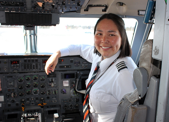 Melissa Haney is pictured in the cockpit of an Air Inuit Dash 8 at the Kuujjuaq airport March 21, before heading north to do a sched run up Nunavik's Ungava coast. Haney, born and raised in Inukjuak, has been flying for Air Inuit for more than a decade, and by this summer, will make captain on the Dash 8 — the first Inuk woman at the airline to do so. Read a profile of the pilot later at www.NunatsiaqOnline.ca. (PHOTO BY KASSANDRA LEDUC)