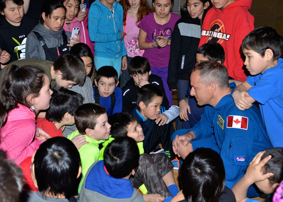 Astronaut David Saint-Jacques speaks to a group of students at Jaanimmarik school in Kuujjuaq last year. Saint-Jacques, who used to work as a doctor at Inuulitsivik health centre in Puvirnituq, has been assigned to a six-month mission aboard the International Space Station, the Canadian Space Agency announced this week. Saint-Jacques will launch aboard the Russian Soyuz rocket in November 2018 to join an international crew onboard the orbiting laboratory. This will mark the 17th space flight for Canadian astronauts. (FILE PHOTO/ ISABELLE DUBOIS) 
